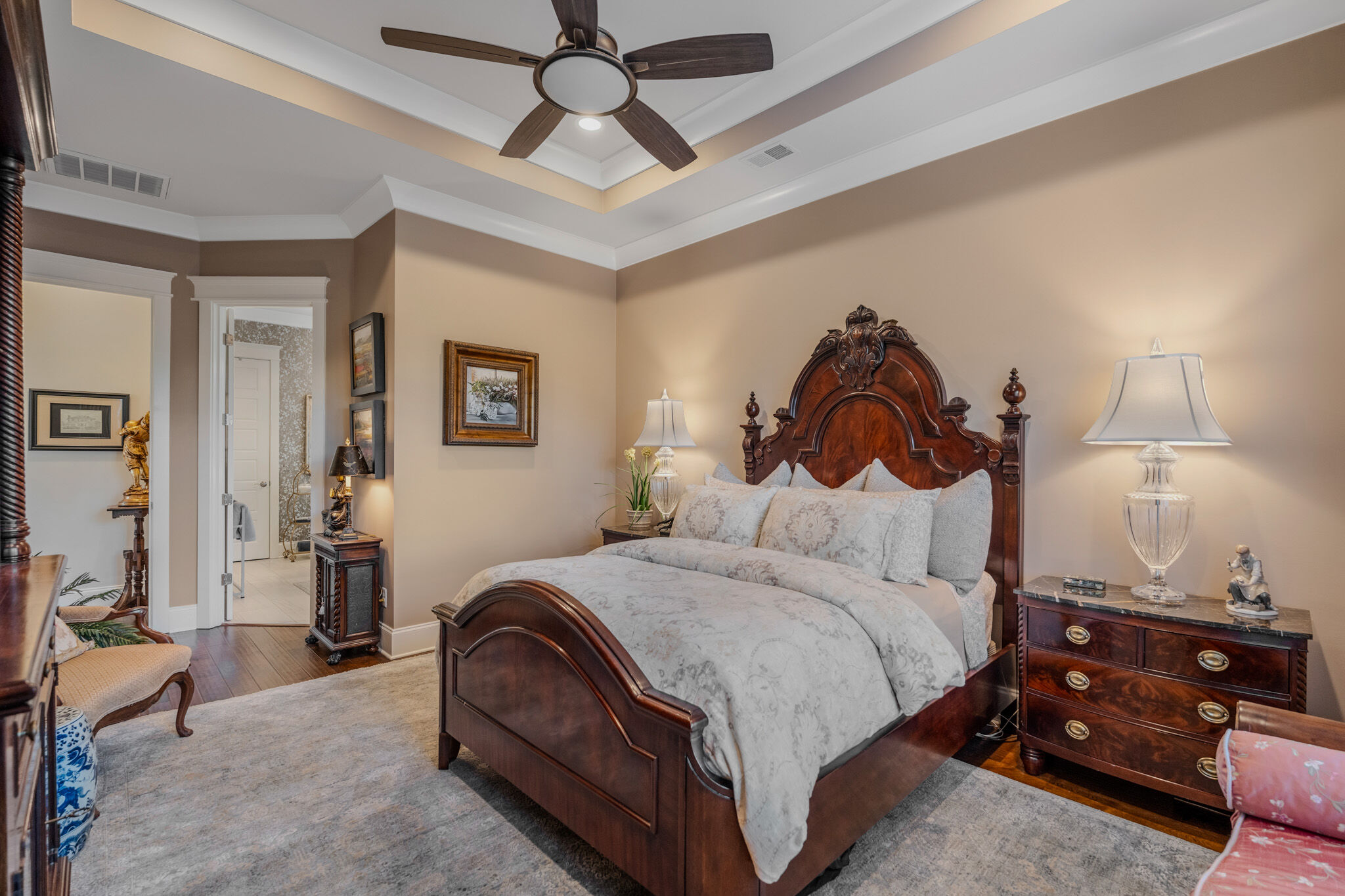 Primary bedroom with tray ceiling