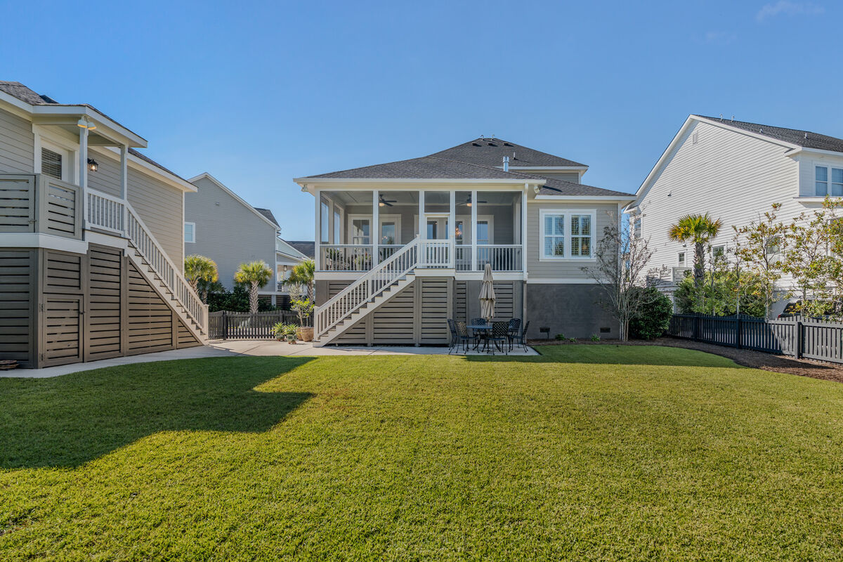 Fenced backyard lawn