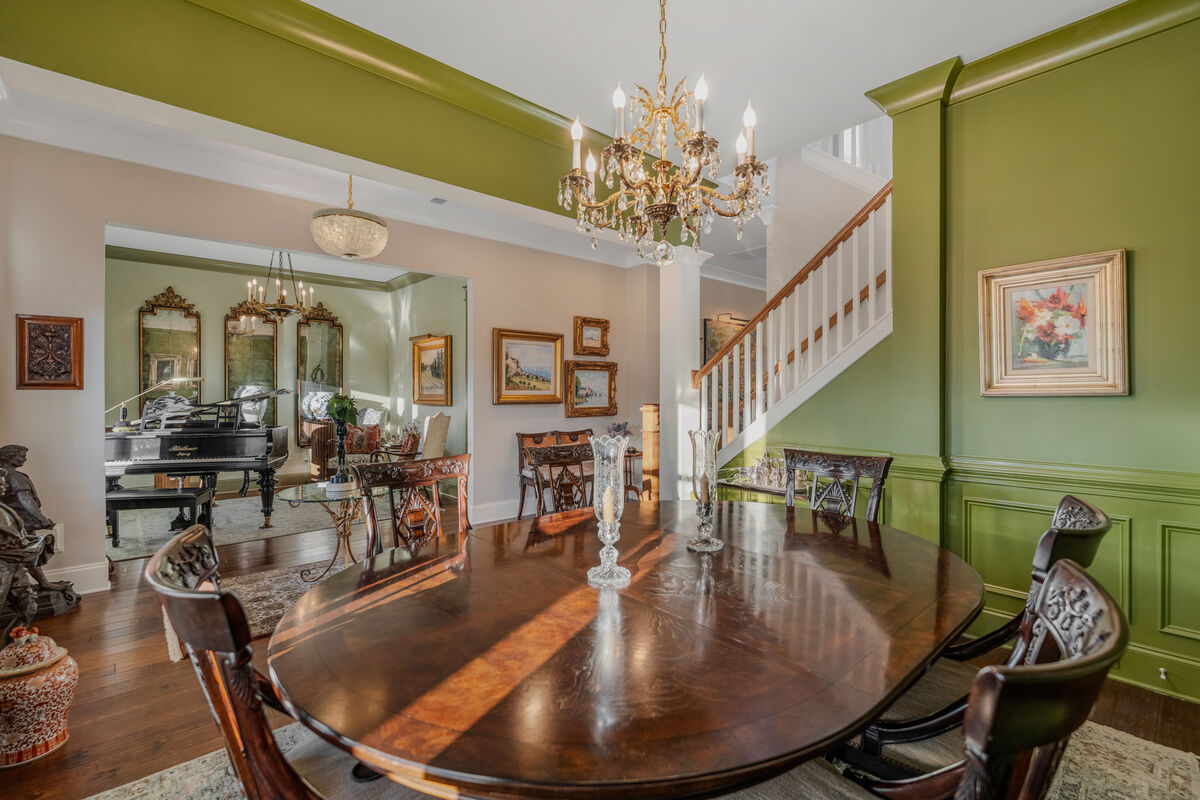 Dining table beneath the chandelier